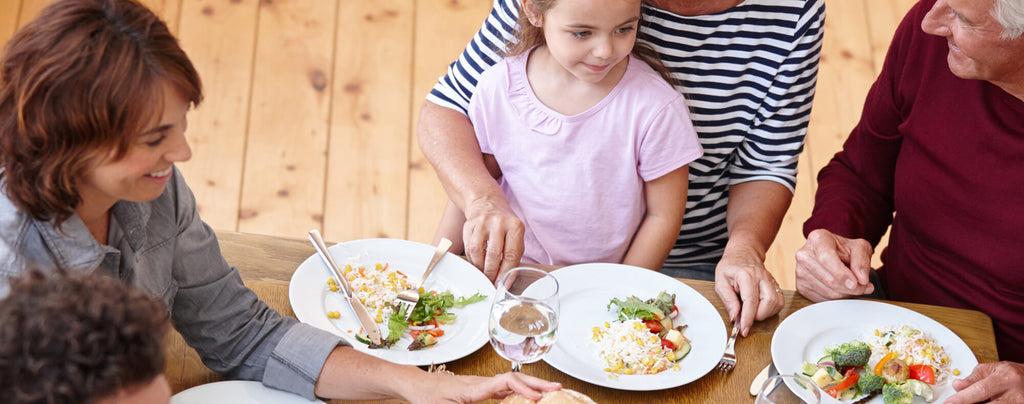 Lovely Family Having Dinner Together